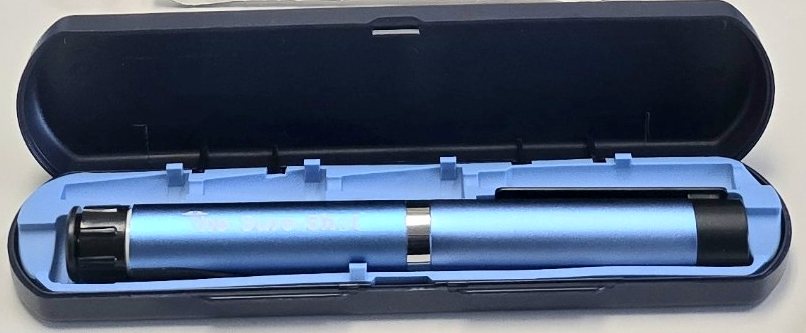 The Sure-Shot click-dose pen in its travel case